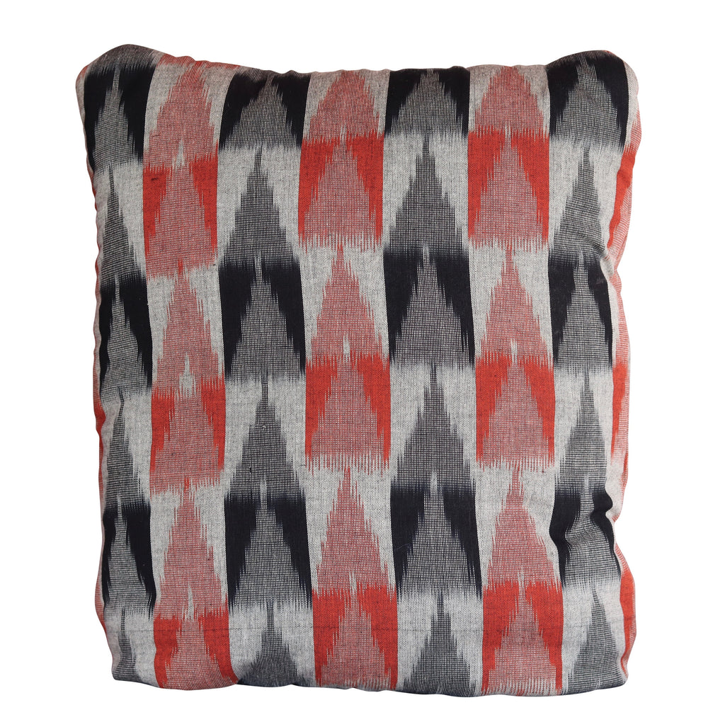 Ikkat Burnt Orange Secret Pillow - a pillow that unfolds into a blanket